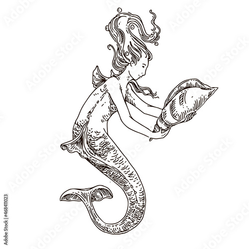 Foto Mermaid holding a shell in her hands