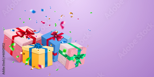 Fototapeta Naklejka Na Ścianę i Meble -  Vector illustration with several colored gift boxes with ribbons and bows, and small blurry pieces of serpentines on purple background
