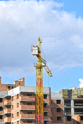 Crane and highrise construction site