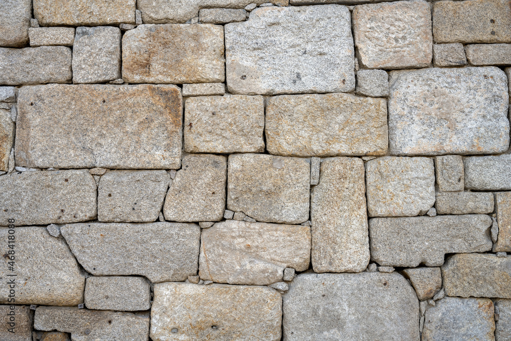 Natural background from an old stone wall Natural background from an old stone wall