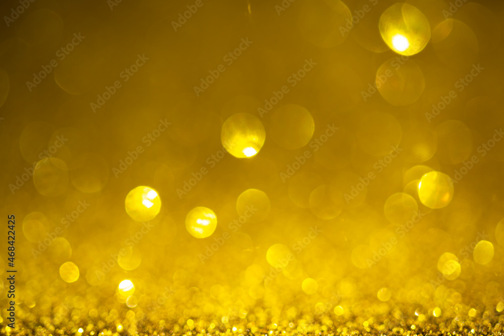 Golden bokeh background. Vintage glitter lights, christmas glowing effects backdrop photo