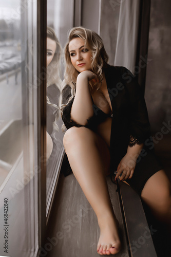 Fényképezés Plus-size woman with long blond hair in lingerie , overweight blonde with lush f