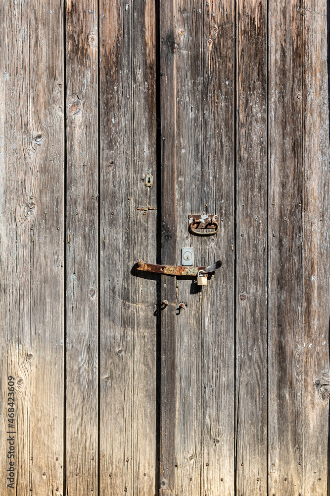 Locked old wooden door Locked old wooden door