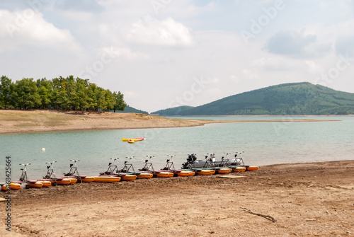 Colorful kayak boats by the lake