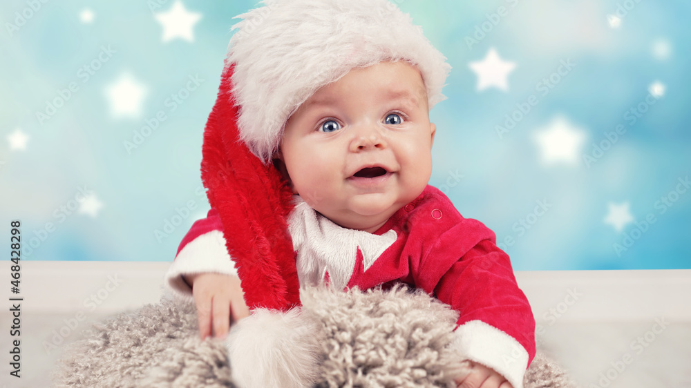 Fototapeta premium Weihnachtsmann Baby