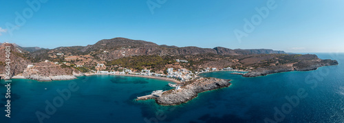 Kapsali Kythera, Greece. Aerial drone panorama of Kythira twin bay coast, harbor beach and village.