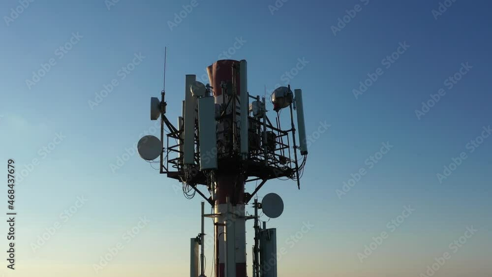 Telecommunication tower of 4G and 5G cellular. Base Station or Base Transceiver Station. Wireless Communication Antenna Transmitter. Telecommunication tower with antennas against blue sky. Telecommunication tower of 4G and 5G cellular. Base Station or Base Transceiver Station. Wireless Communication Antenna Transmitter. Telecommunication tower with antennas against blue sky.