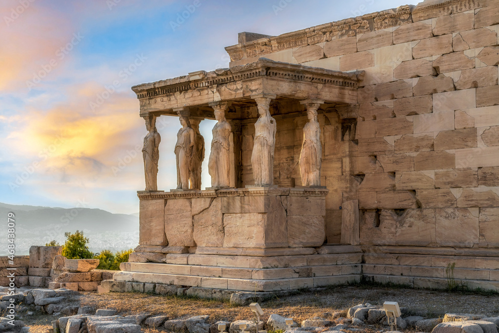 Erechtheion Temple (or Erechtheum) with the figures of Caryatids at the archaeological site of Acropolis in Athens, Greece at sunset. It was dedicated to both Athena and Poseidon. Golden soft light Erechtheion Temple (or Erechtheum) with the figures of Caryatids at the archaeological site of Acropolis in Athens, Greece at sunset. It was dedicated to both Athena and Poseidon. Golden soft light