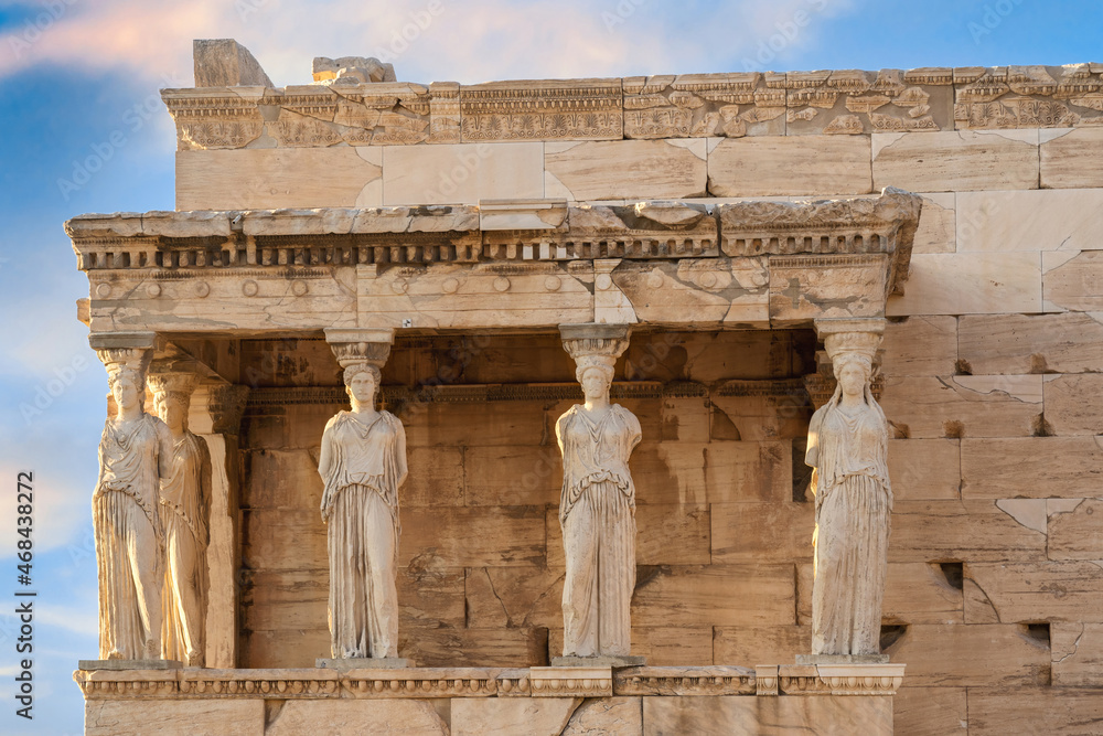 The Caryatids of Erechtheion Temple (Erechtheum) at the archaeological site of Acropolis. Caryatids are sculpted female figures used as decorative architectural support in place of columns or pillars