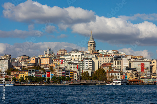 The Galata tower and the old quarters of Istanbul on the background of blue sky. Tourist destination Istanbul Turkey