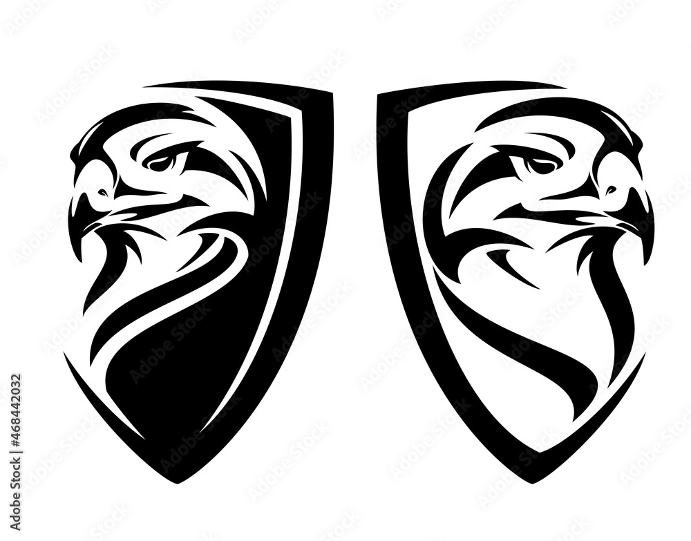 wild hawk bird head and simple heraldic shield - guard eagle insignia badge modern black and white vector design wild hawk bird head and simple heraldic shield - guard eagle insignia badge modern black and white vector design