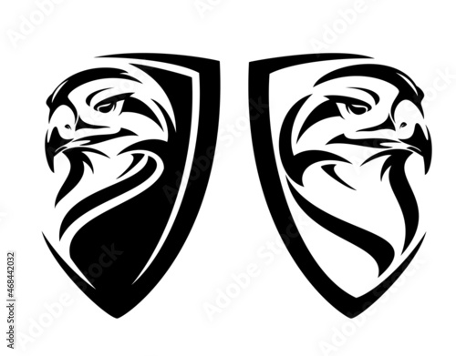 wild hawk bird head and simple heraldic shield - guard eagle insignia badge modern black and white vector design