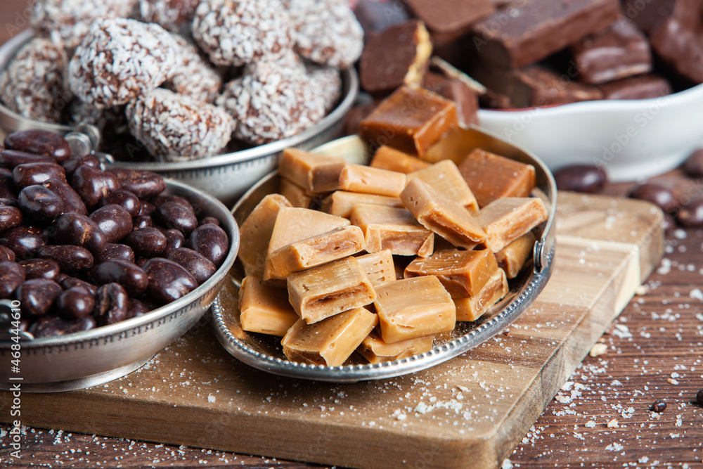 Assortment of delicious chocolate candies background. Chocolate candy isolated Assortment of delicious chocolate candies background. Chocolate candy isolated