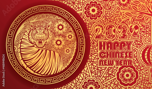 Chinese new year 2022, year of the tiger banner with gold tiger zodiac and gold flower and asian elements paper cut with craft style.