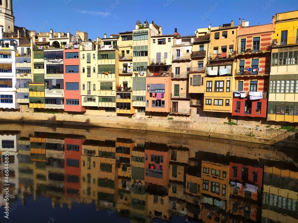 Colored houses reflected in the river Colored houses reflected in the river