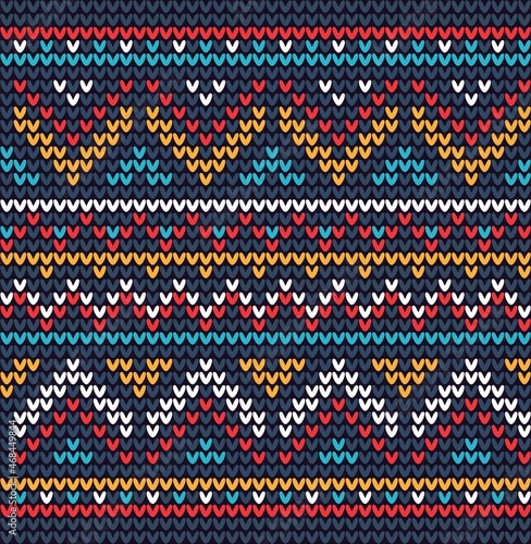 Knitted seamless pattern with folk ornaments. Knitted Mexican pattern. Vector illustration.