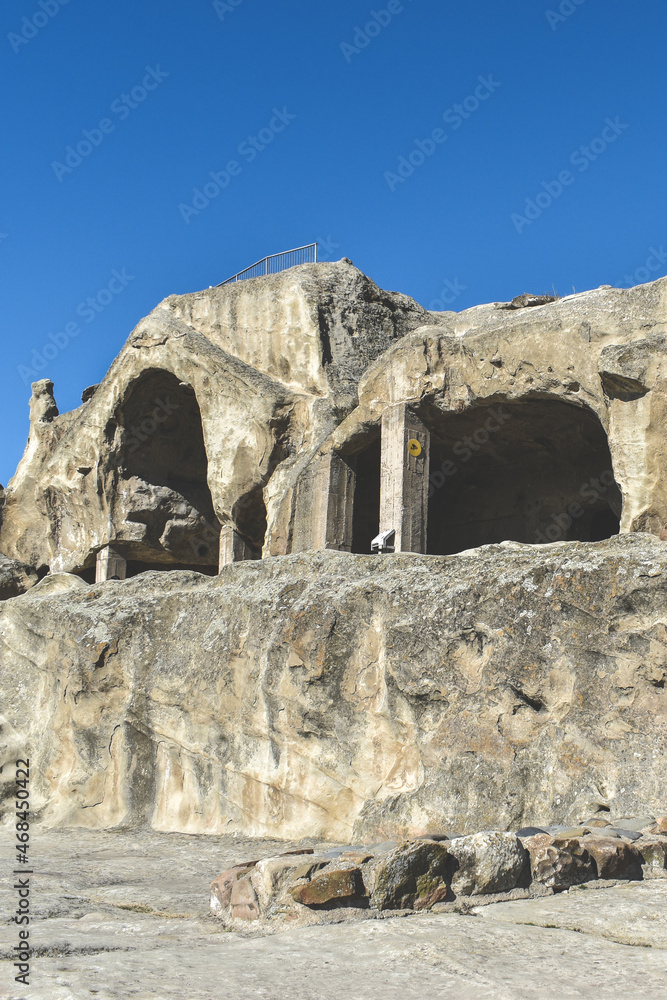 The Uplistsikhe cave complex near Gori, Georgia. Ancient rock-hewn town and three-nave basilica in eastern Georgia. Georgian gourist landmark