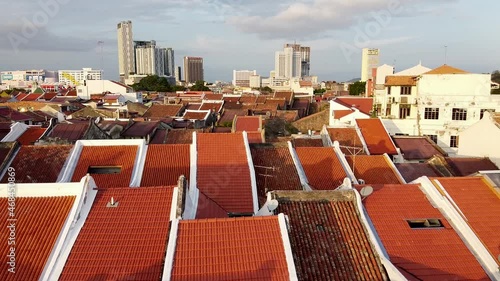 Malacca aerial view at sunset. Sky colors over Melaka city skyscrapers photo