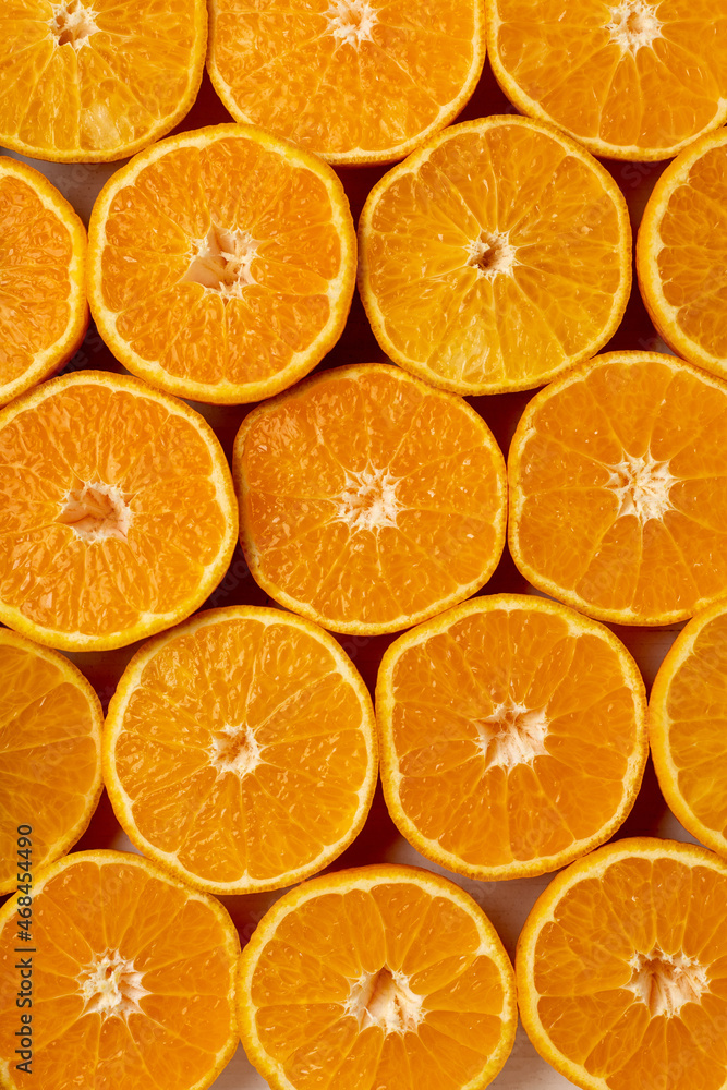 Fototapeta premium Juicy orange solid orange slices pattern