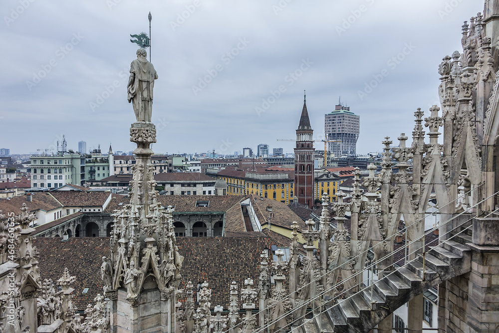 Spires on roof top of Milan Cathedral. Milan Cathedral (Duomo di Milano) dedicated to St Mary of the Nativity, with Gothic and Lombard Romanesque style. MILAN, ITALY. 
