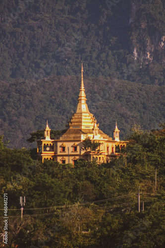 Vertical shot of Wat Pa Phon Phao on a hill of Luang Prabang, Laos photo