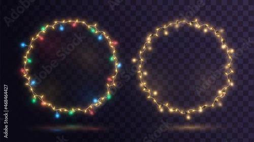 Multicolored and gold glowing garlands in the form of a ring, festive round frame