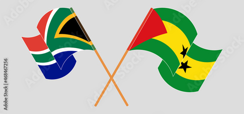 Crossed and waving flags of South Africa and Sao Tome and Principe