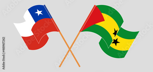 Crossed and waving flags of Chile and Sao Tome and Principe
