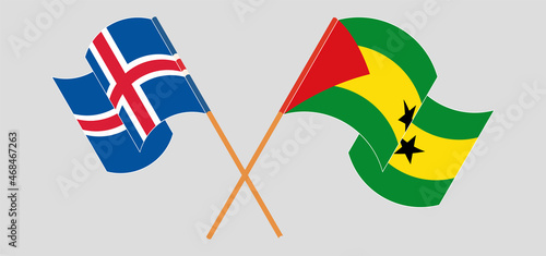 Crossed and waving flags of Iceland and Sao Tome and Principe