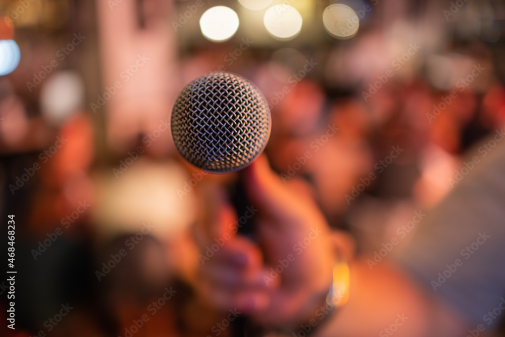 Viewer crowded audience speak with speaker in microphone. Participant