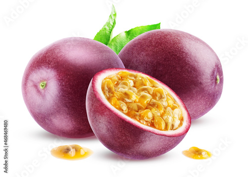 Two whole ripe purple passion fruit and half with juicy pulp isolated on white background.