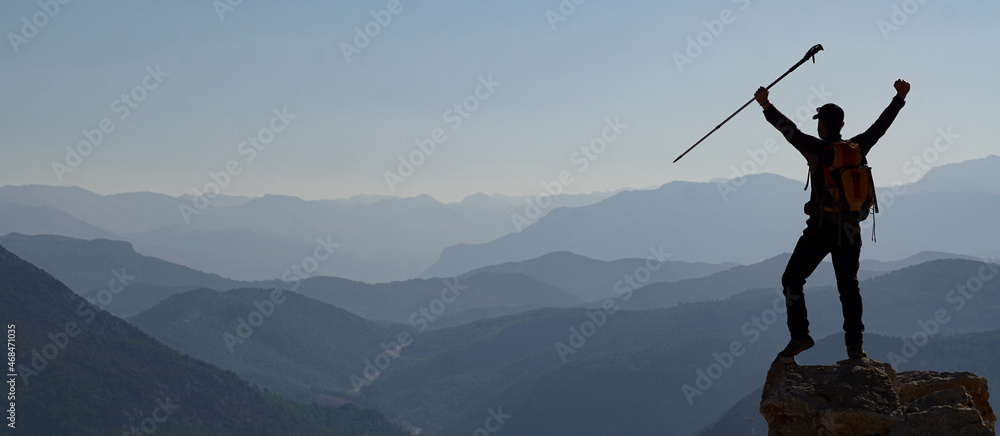 silhouette of a person on a mountain silhouette of a person on a mountain