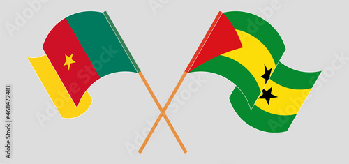 Crossed and waving flags of Cameroon and Sao Tome and Principe