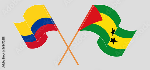 Crossed and waving flags of Colombia and Sao Tome and Principe