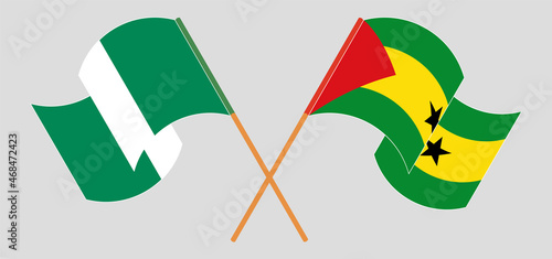 Crossed and waving flags of Nigeria and Sao Tome and Principe