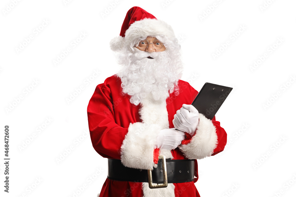Surprised Santa Claus holding a clipboard and looking at camera Surprised Santa Claus holding a clipboard and looking at camera