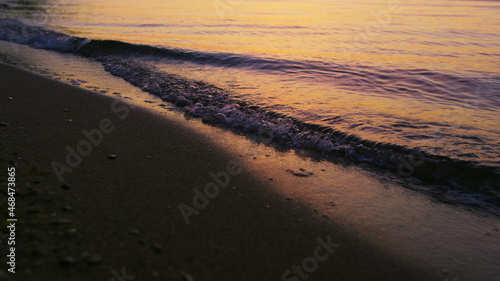 Wallpaper Mural Closeup sea waves splashing sandy beach in cold evening sunset dusk slow motion Torontodigital.ca
