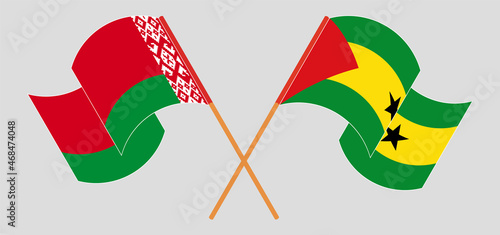 Crossed and waving flags of Belarus and Sao Tome and Principe