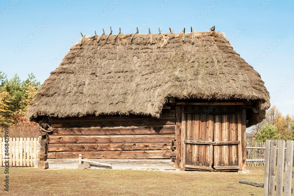 Old wooden building, rural village scenic, Poland.