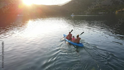 The family is kayaking. Blue color. Active rest. Oludeniz, Blue Lagoon