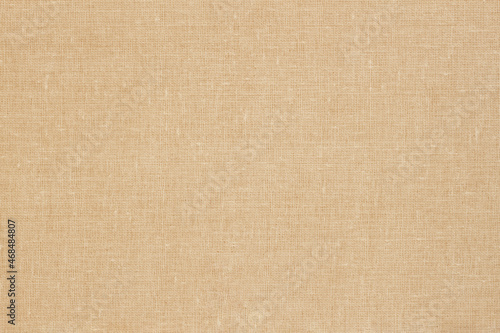 Sackcloth or natural organic burlap background with visible texture