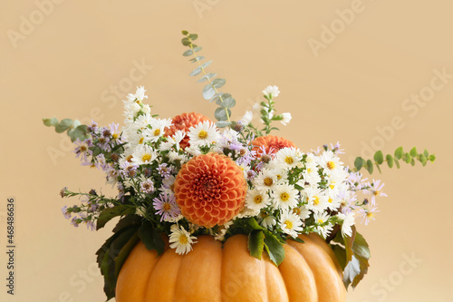 Wallpaper Mural Beautiful autumn bouquet in pumpkin on light background Torontodigital.ca