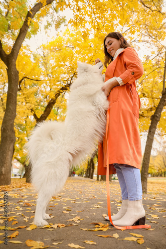 Young woman with funny Samo...