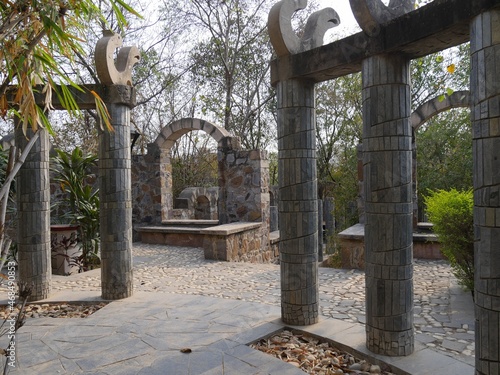 Photography Rows of concrete pillars at the Garden of Five Senses in New Delhi, India