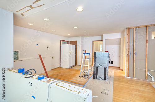 Valokuva Old kitchen cabinets, counter, island and appliances removed in preparation for