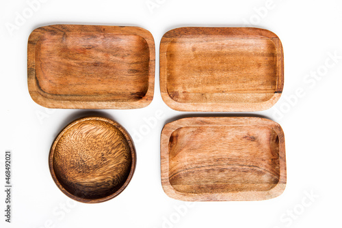 wooden round and rectangular eco-friendly bowls on white background