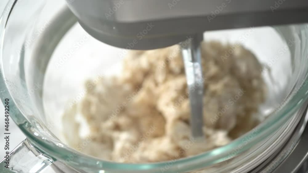 Step by step. Mixing ingredients in kitchen mixer to bake homemade brioche buns. Step by step. Mixing ingredients in kitchen mixer to bake homemade brioche buns.
