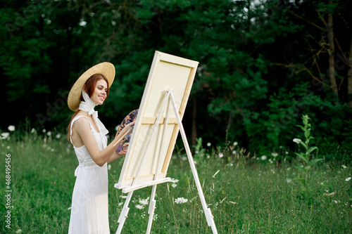 pretty woman in white dress outdoors drawing art creative © VICHIZH