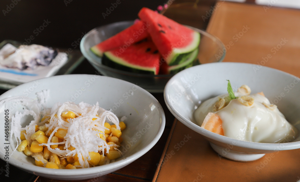Closeup of sweet corn and coconut in white ceremic dish. Closeup of sweet corn and coconut in white ceremic dish.