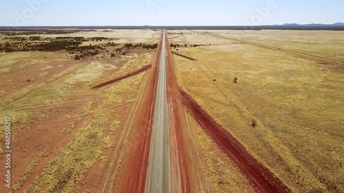 Aerial View of Wide Open Landscape Road with Unique Markings in Alice Springs photo